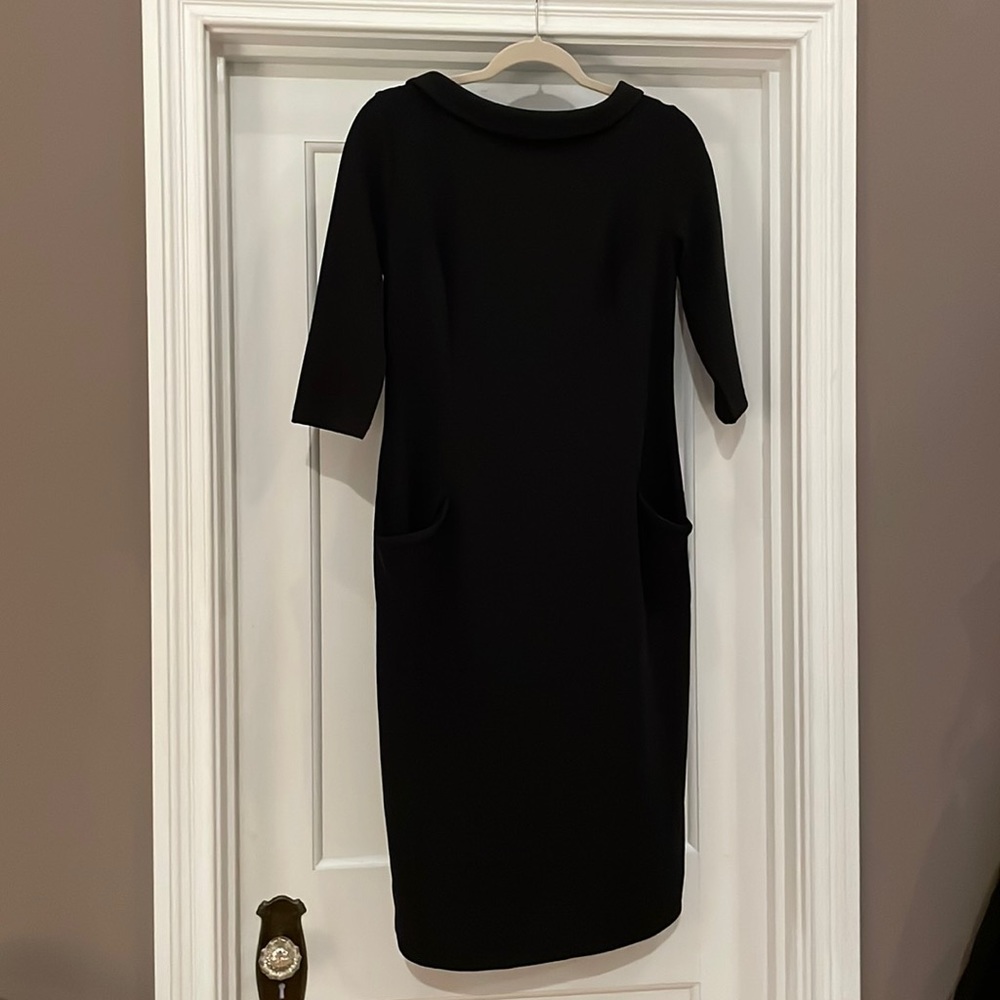 Black formal dress. Top of shoulder to bottom is 41”.  Sleeves are 3/4 length.